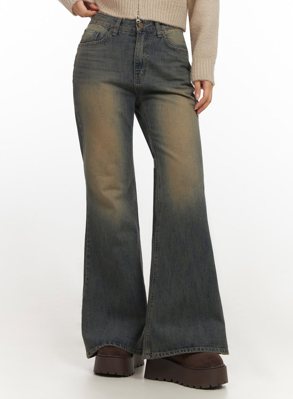 Kourtney Vintage Wash Flared Jeans IF510 in dark blue, front three-quarter-length shot on model, slim-fit flared cotton denim highlighting golden vintage-wash thigh fade and wide flared hem.