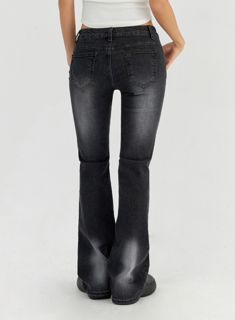 Bootcut Washed Jeans CO325 in dark gray, back view on model from waist to ankle, twin back patch pockets with stitching detail, slim fit through seat and thigh, bootcut flare at hem.