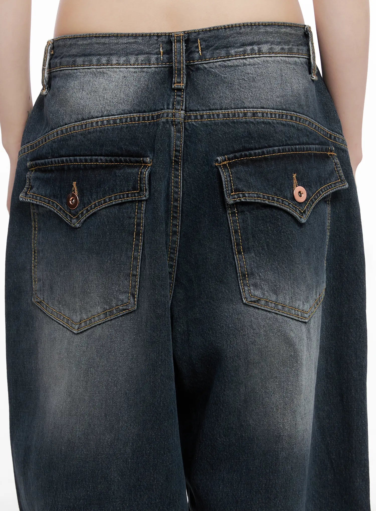 Celi Vintage Wash Wide-Leg Jeans CG515 in dark vintage wash, back waist close-up on model, curved flap back pockets with button hardware and contrast stitching on faded cotton denim.