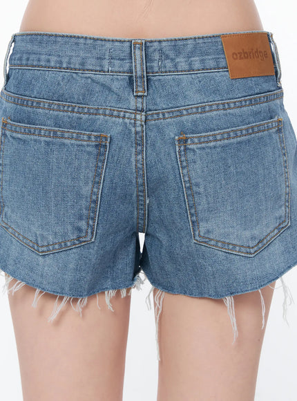 sarahi-low-rise-distressed-denim-shorts-ca530