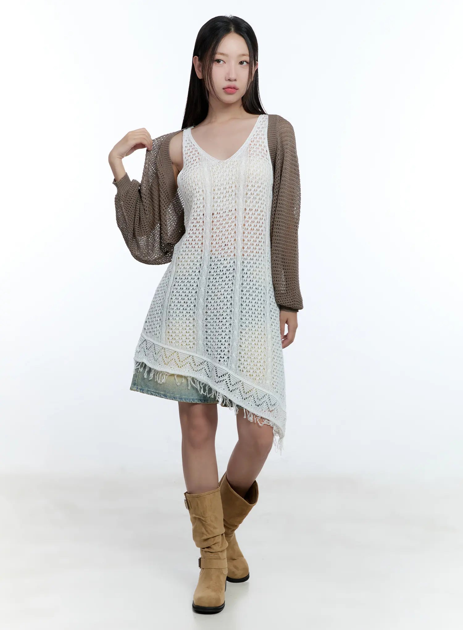 Vintage Wash Jorts CU527 in light blue, full-body side-angled shot on model, visible hem peeking under asymmetric crochet dress and brown knit cardigan, with boots.