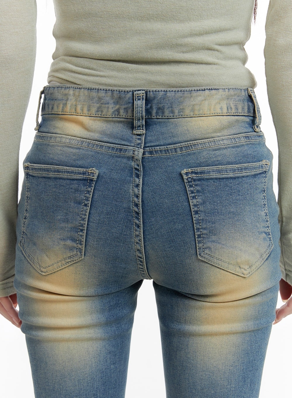 Slim Fit Washed Bootcut Jeans CA402 in blue, back close-up on model, dual back patch pockets with contrast stitching, heavy yellow wash fading at waistband and seat area.