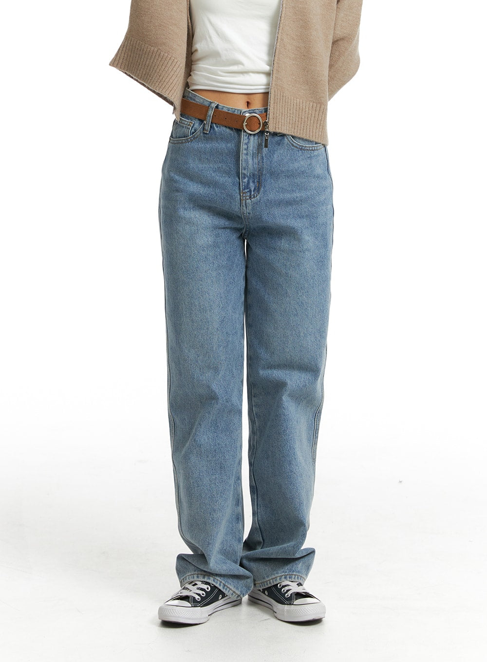 Washed Straight Wide Denim OJ405 in blue, front mid-body close-up on model, high-rise five-pocket design with brown belt, straight wide leg pooling at ankle over sneakers.