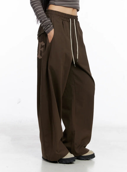 embroidered-back-pocket-drawstring-trackpants-cs509