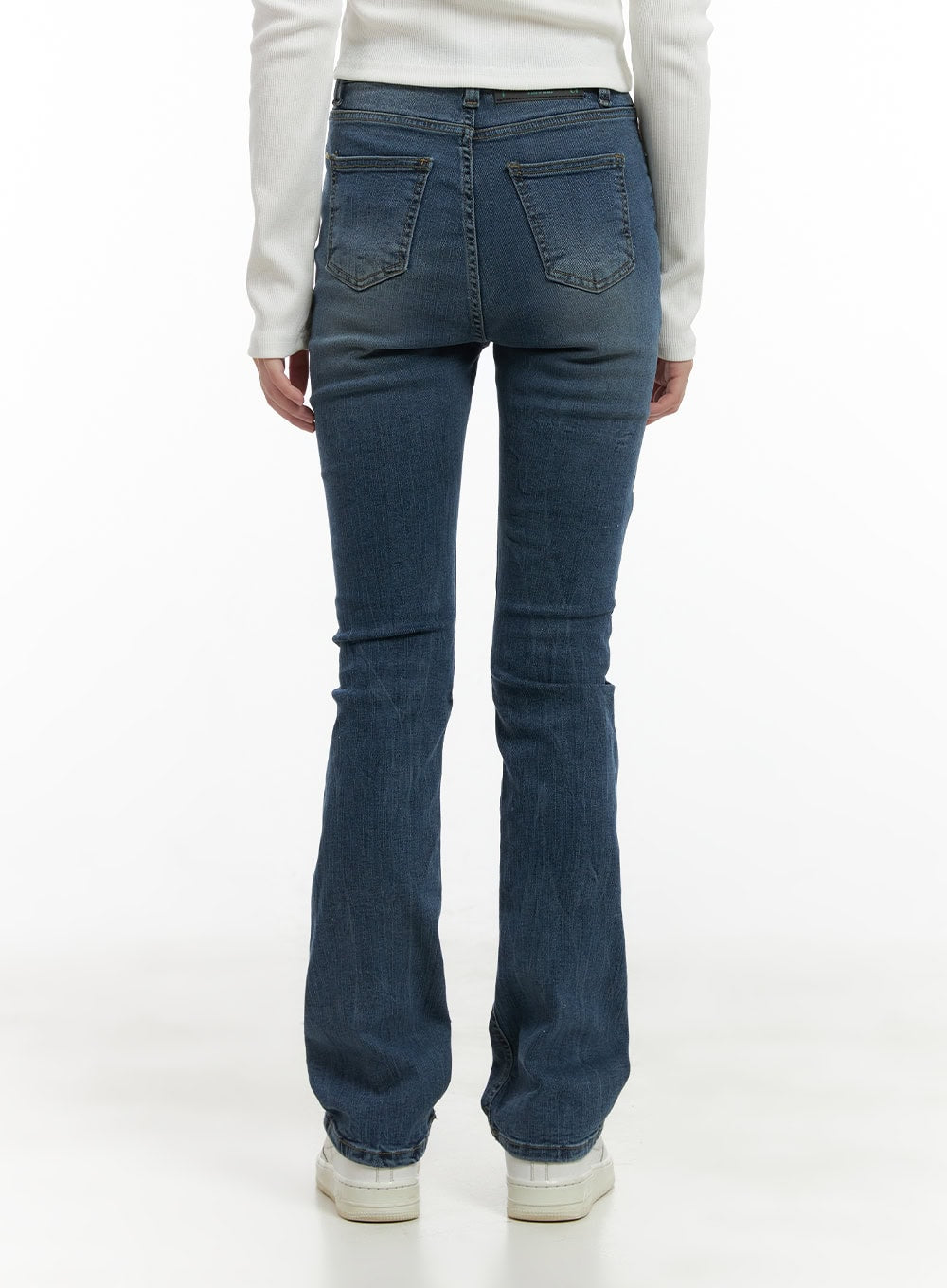 Pixie Slim Washed Bootcut Jeans CG427 in blue, back close-up waist-to-hem shot, showing dual back pockets with faded wash detail and subtle bootcut leg opening, slim fit denim.