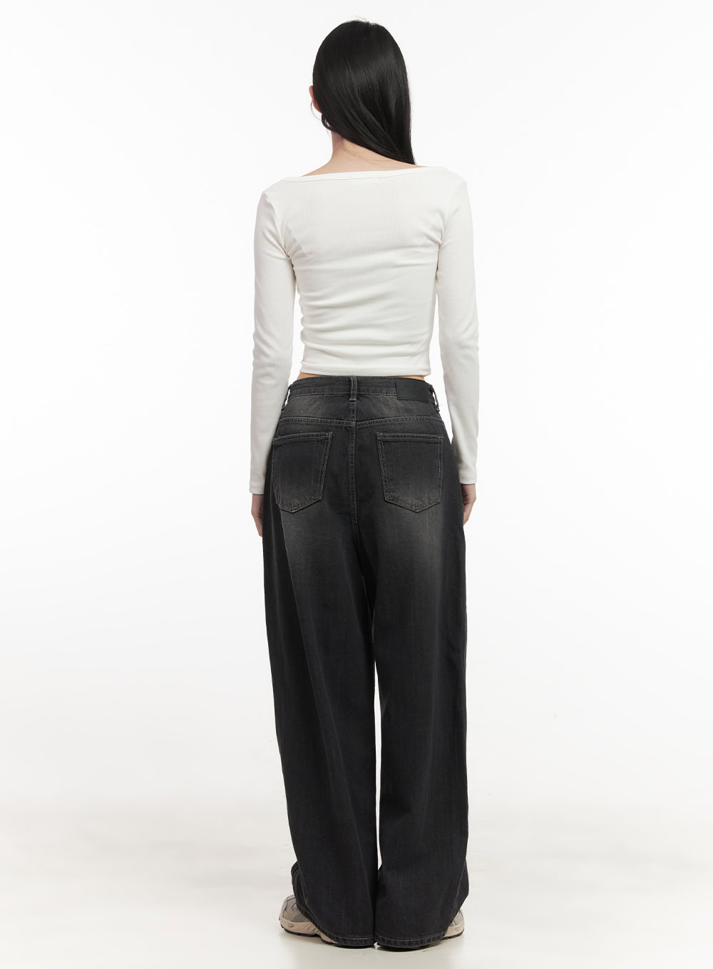 Ruth Washed Wide-Leg Jeans CF514 in black, full-length back view on model, floor-grazing wide-leg silhouette, paired with white long-sleeve crop top and sneakers.