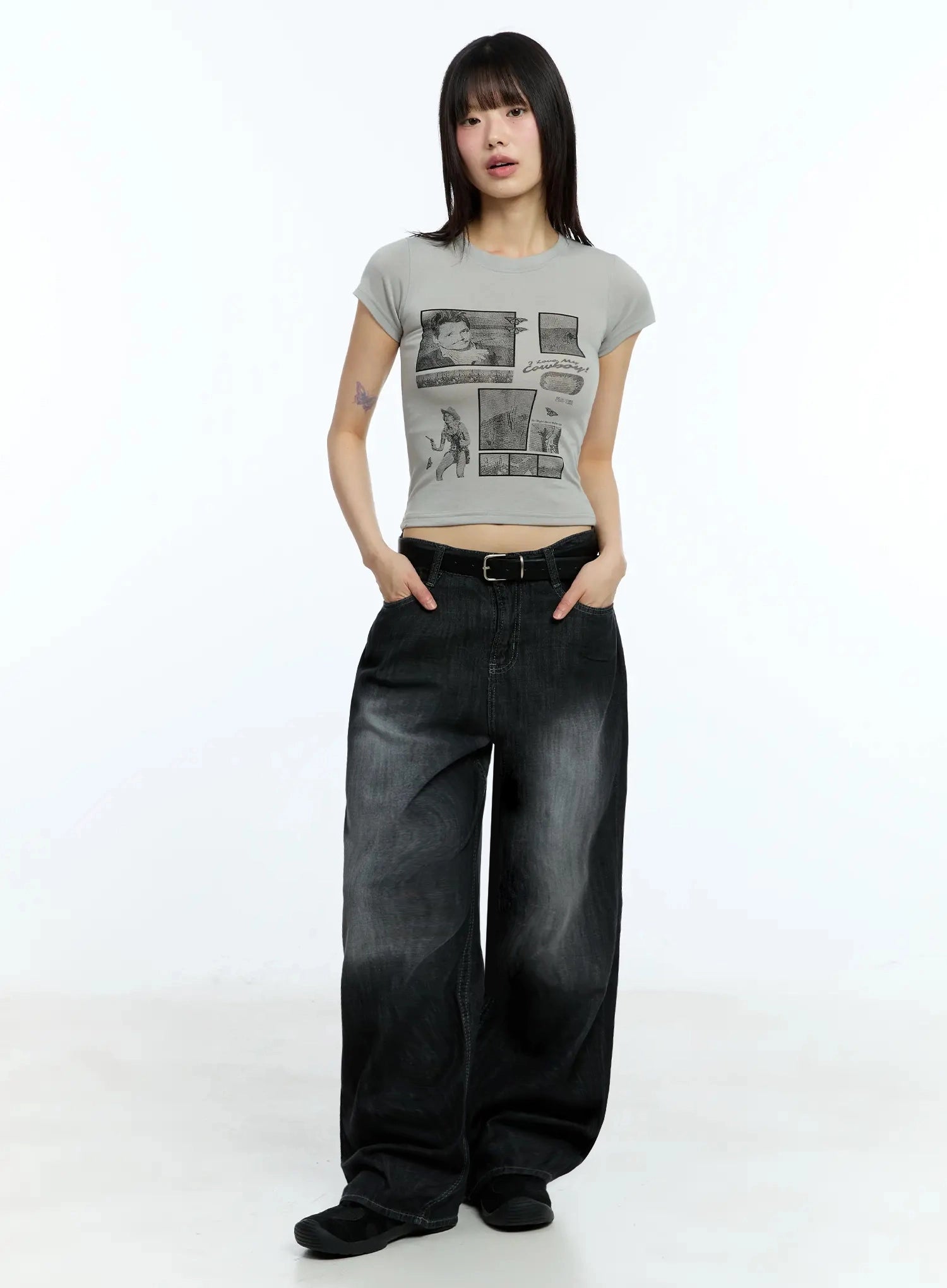 Wendy Washed Wide-Leg Jeans IU524 in black, full-length front shot on model, hands in pockets, relaxed wide-leg silhouette with washed finish, paired with grey crop tee and belt.