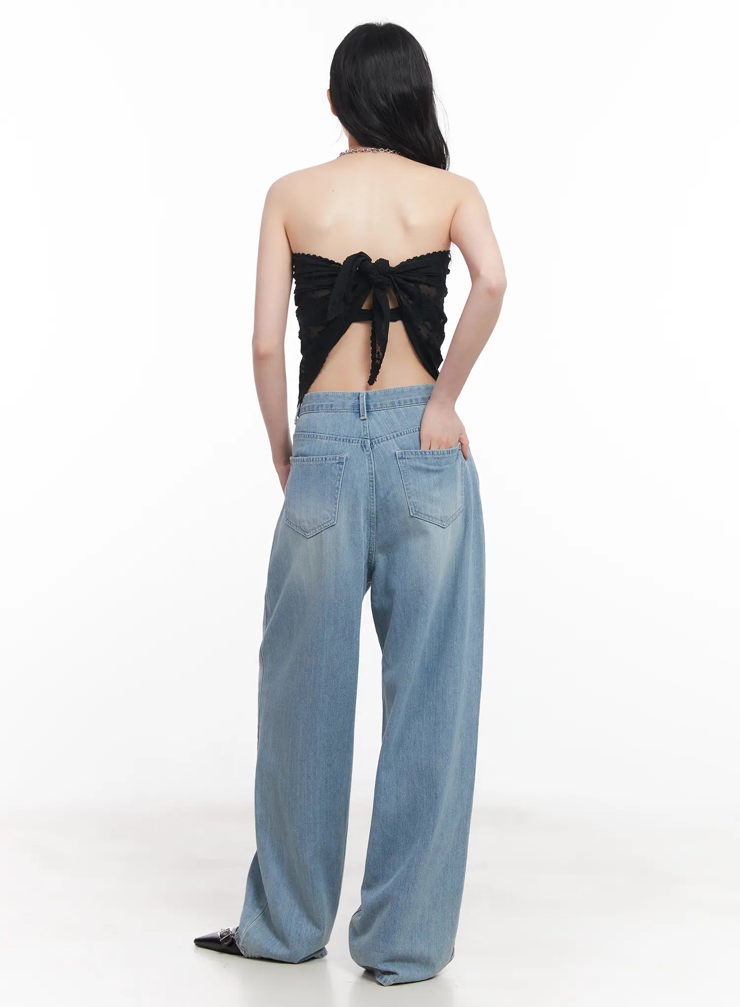 Rose Washed Baggy Summer Denim Jeans CU511 in light blue, back full-length view on model, wide-leg washed denim showing back pockets and relaxed hem, paired with black lace open-back top.