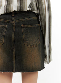 destroyed-hem-denim-mini-skirt-cm427