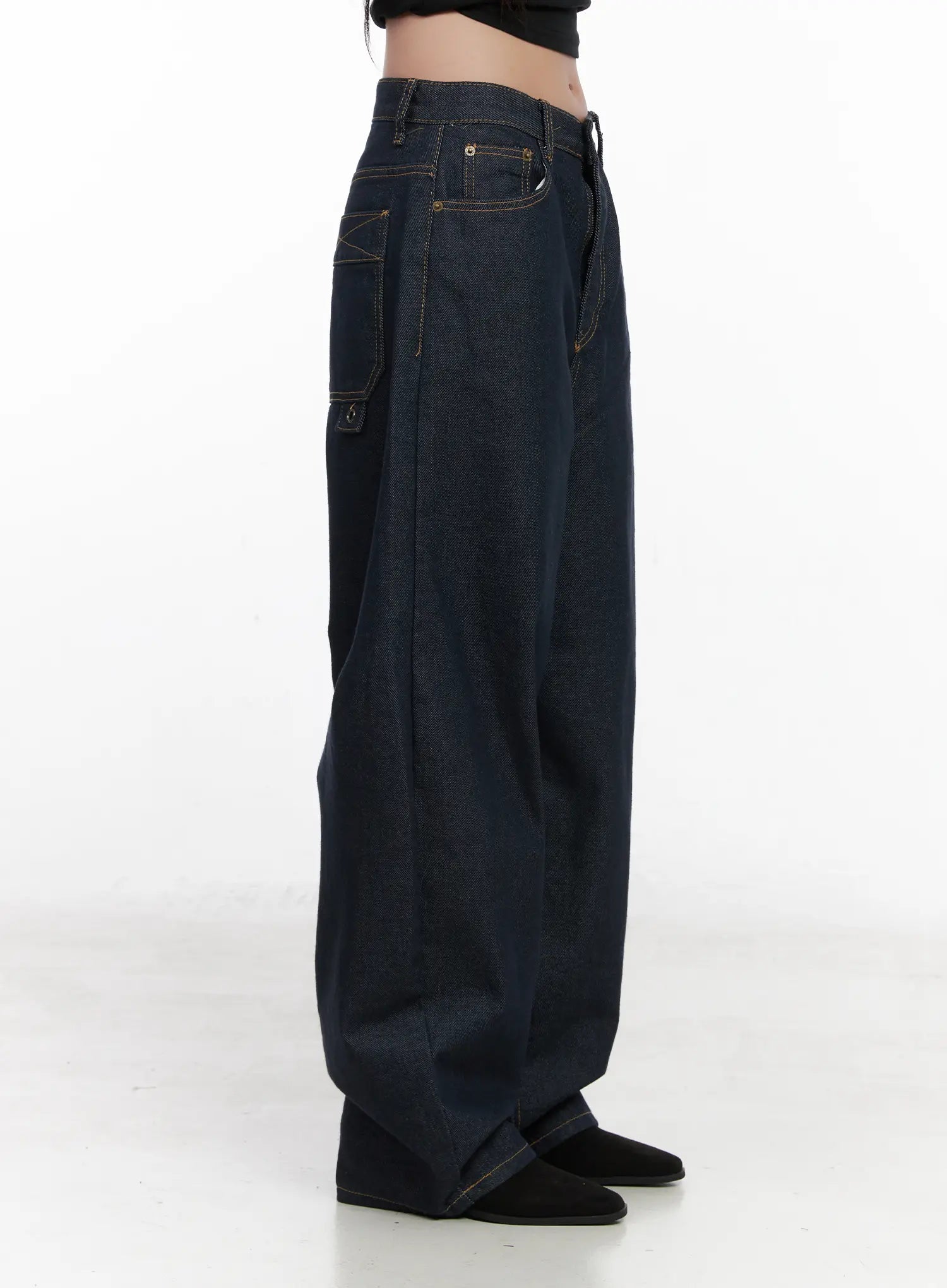 Heaven Wide-Leg Dark Washed Jeans CN513 in dark blue, side close-up product shot on model, highlighting front coin pocket, contrast stitching, and exaggerated wide-leg drape.