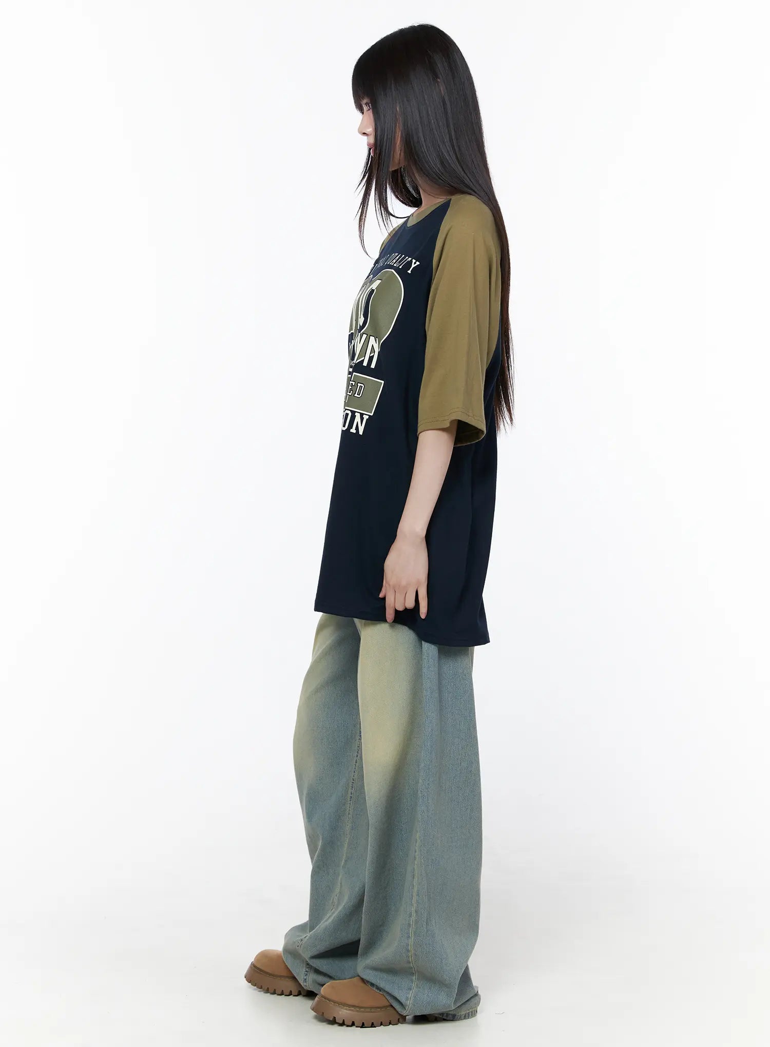 Rain Vintage Washed Wide Leg Jeans CU519 in light blue, side full-body on model, wide balloon-like leg with sun-faded wash, paired with oversized raglan tee and chunky platform shoes.