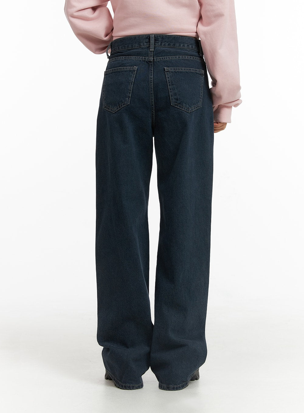 Washed Wide Leg Jeans CJ429 in dark blue, back close-up on model from waist to hem, highlighting dual back patch pockets and washed denim texture, with pink sweatshirt.