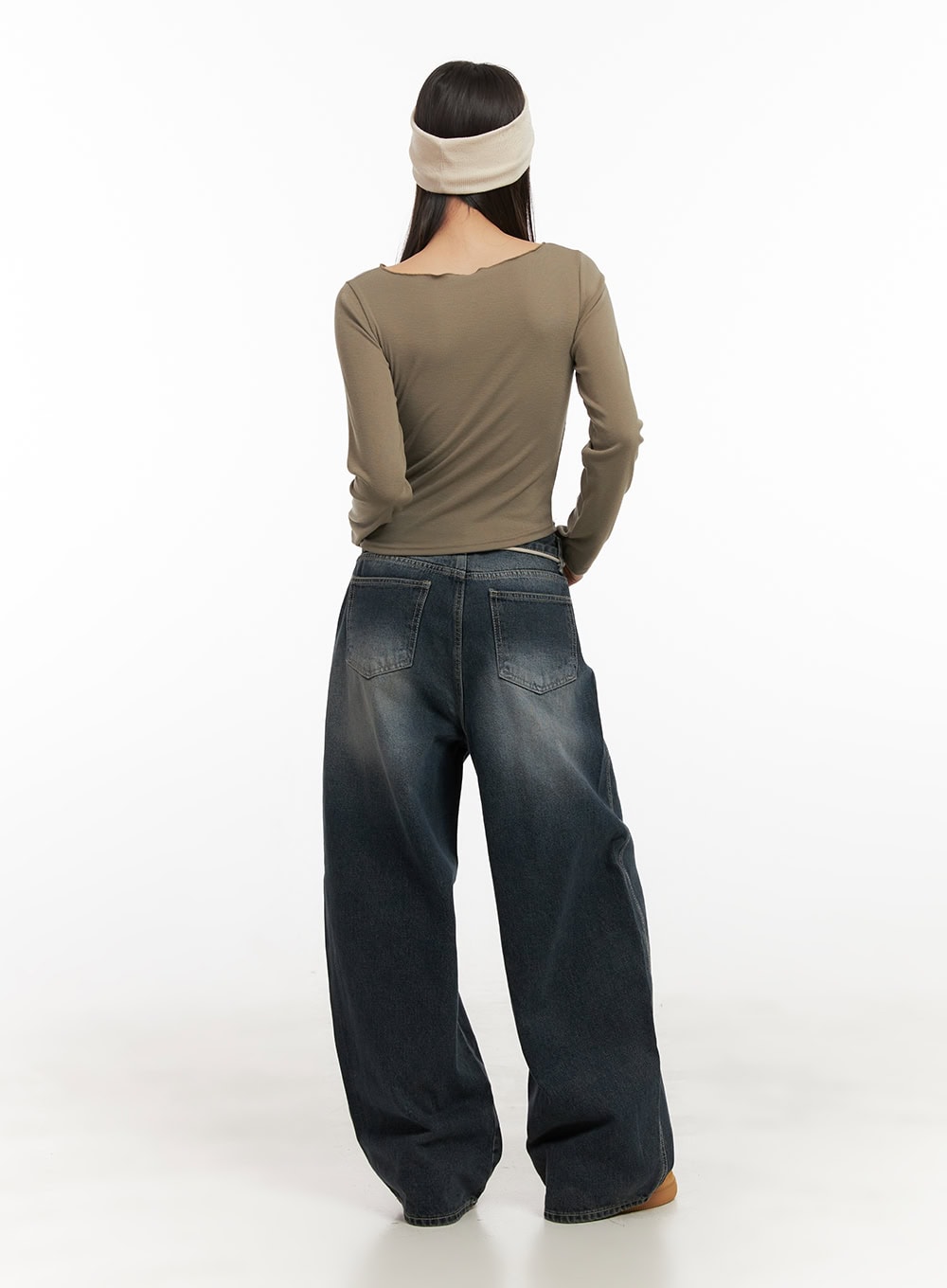 Vivian Washed Cotton Baggy Jeans CD409 in dark blue, full-body back shot on model, baggy wide-fit with washed indigo fade, styled with olive long-sleeve crop and cream headband.