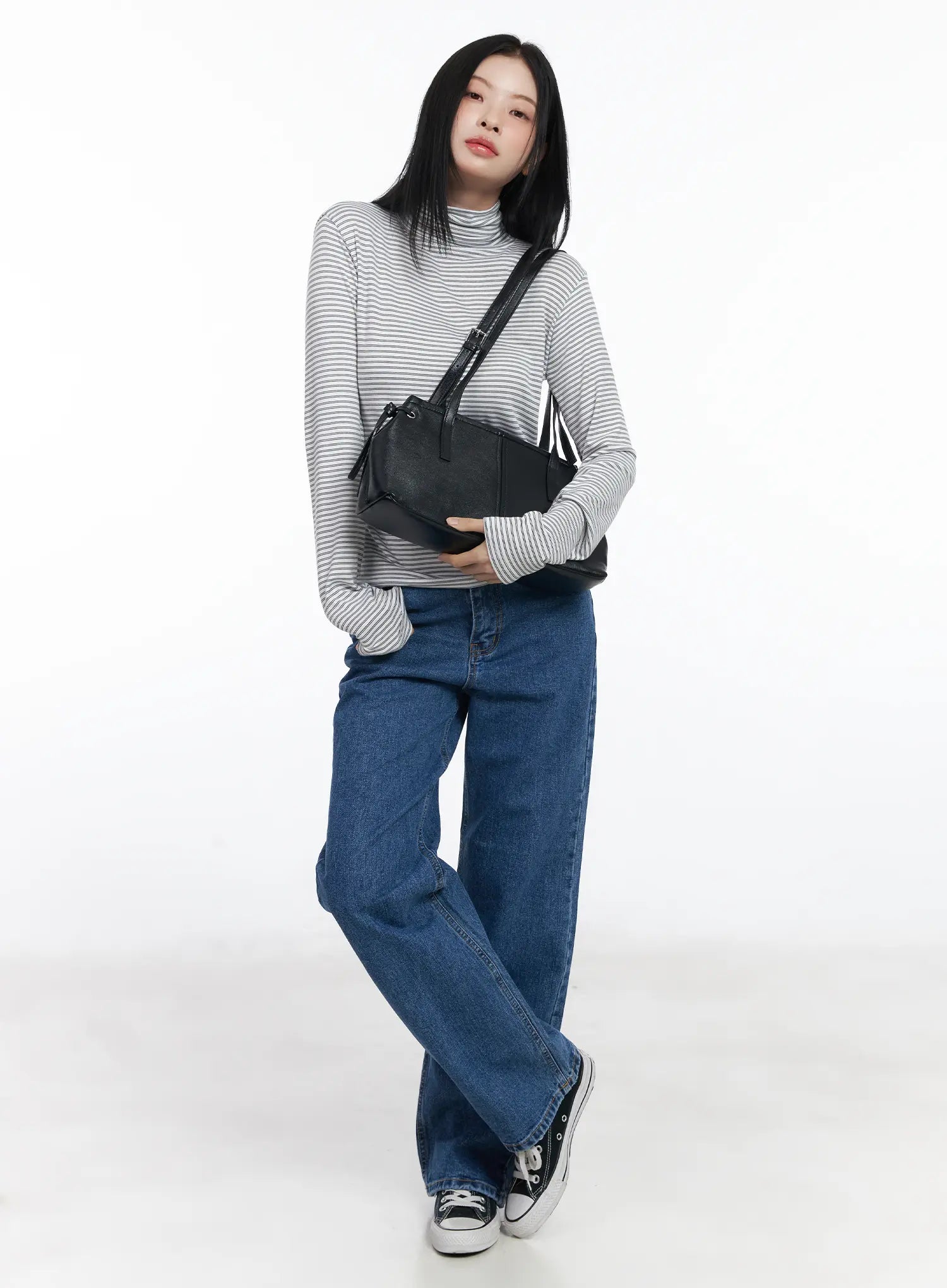 Aila Relaxed Fit Jeans CJ519 in blue, full-body front outfit shot on model, wide-leg casual denim styled with striped turtleneck and black crossbody bag.