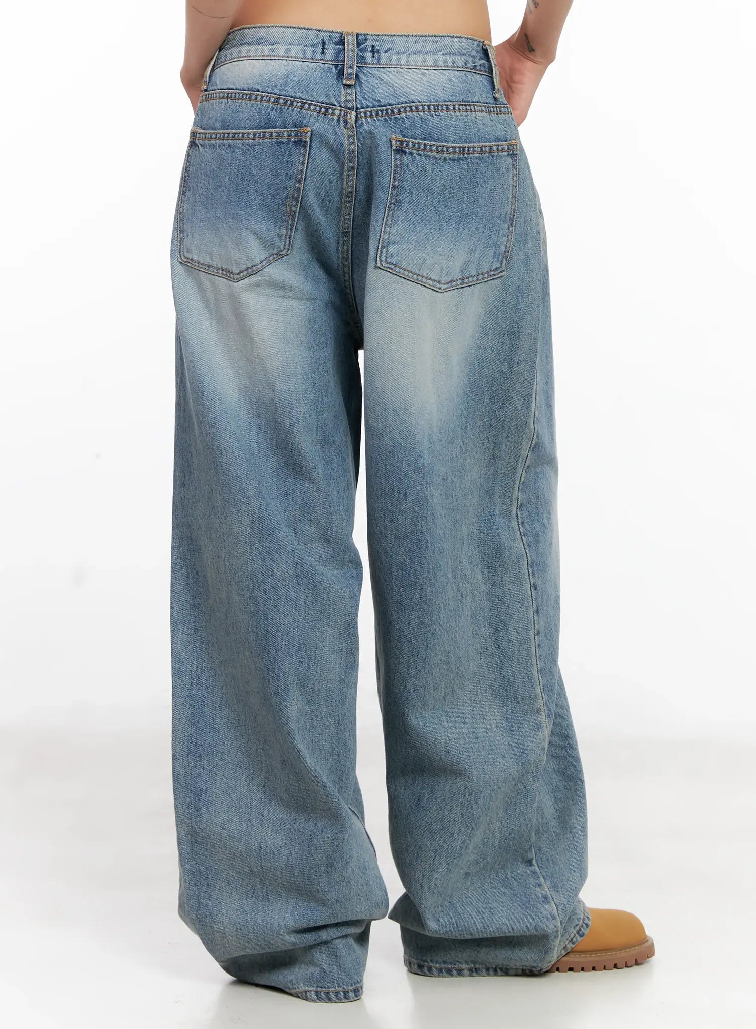 Koko Vintage-Wash Baggy Jeans CL528 in blue, back full-length on model, showing dual back pockets with stitching and vintage-wash cotton wide-leg denim.