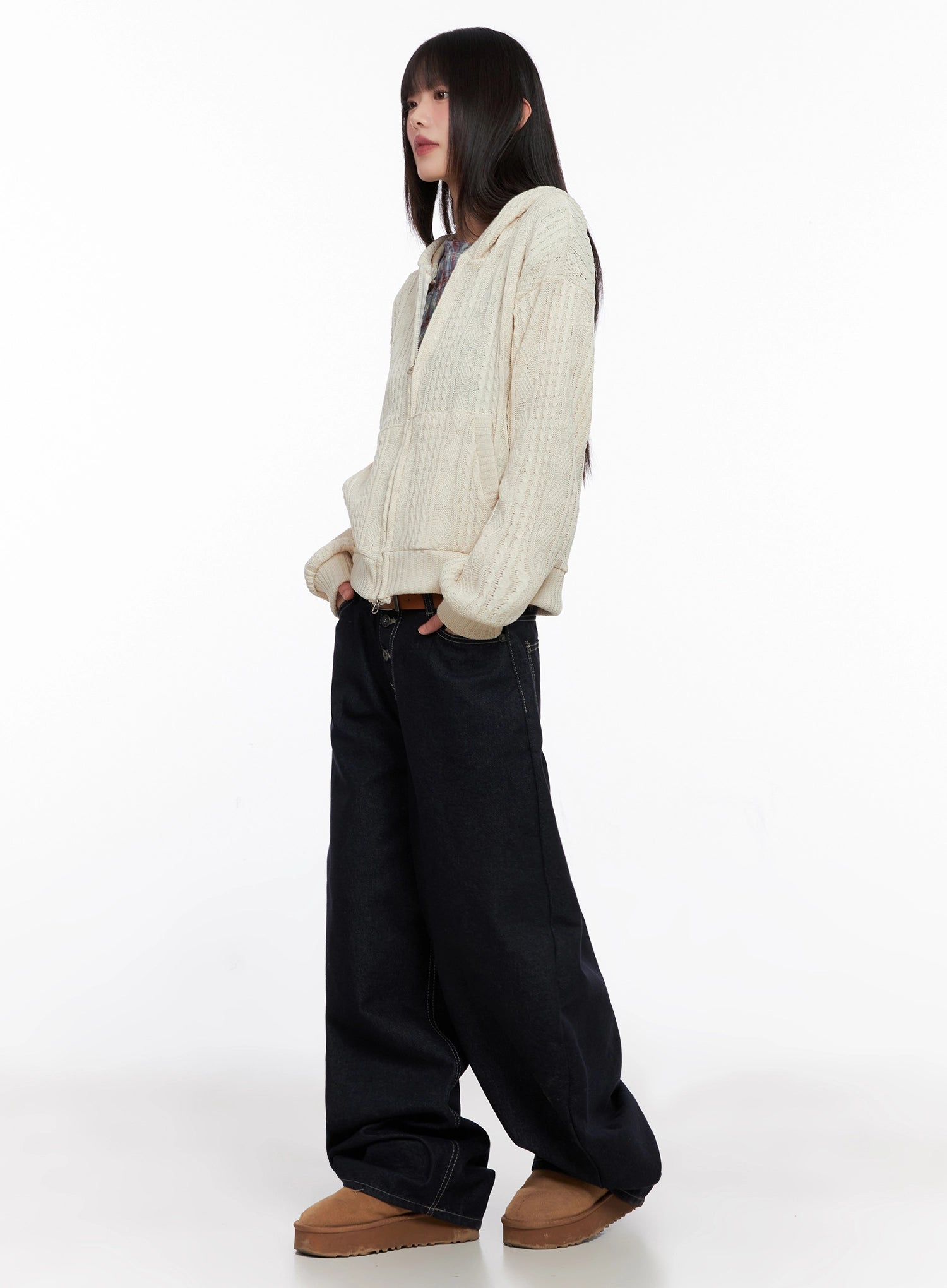 Jazlyn Non-Fade Button Wide Leg Jeans IN503 in dark blue, side view on model wearing cream cable-knit hoodie and brown belt, showcasing the dramatic wide-leg volume and long length.