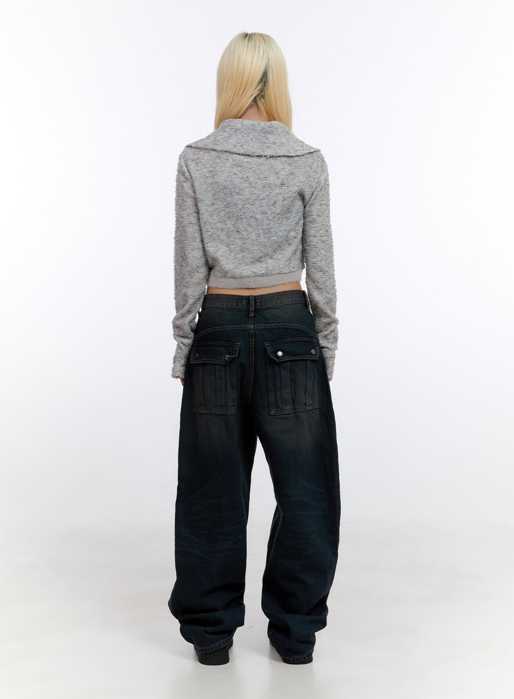 Lyla Wide Leg Jeans CO423 in dark blue, back full-length on model, slouchy wide-leg washed denim with cargo-style back pockets, styled with grey cropped cardigan.