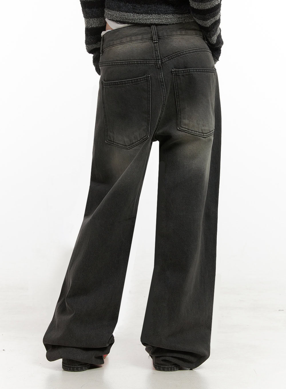 Matilda Wide-Fit Baggy Jeans ID402 in black, back view close-up on model, washed denim with patch back pockets and faded finish, wide-leg silhouette floor-length hem.