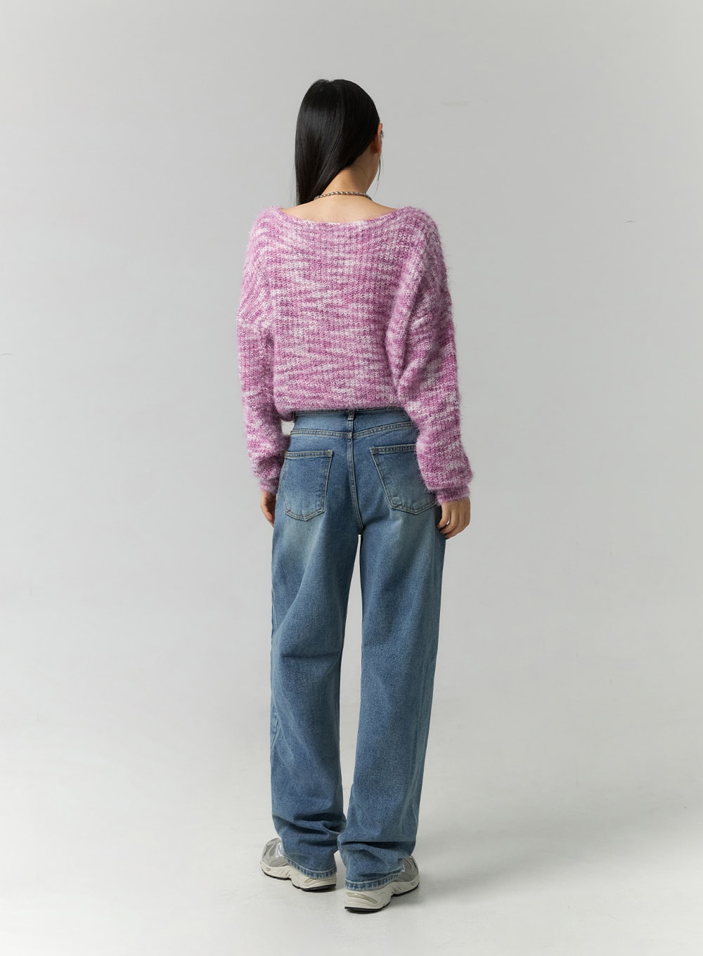 Straight Fit Jeans CN324 in blue, full back view on model, wide-leg washed denim showing two back pockets and relaxed straight fit, styled with pink sweater.