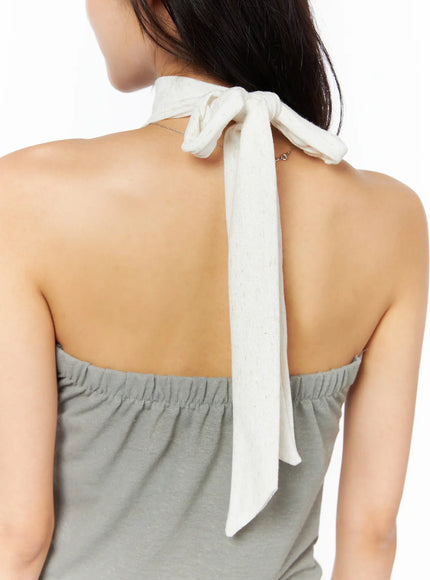Neck-Tie Halter Top CU522 in dark green, back neck detail close-up on model, cream textured neck-tie knotted at nape, open back design with gathered elastic back band visible.