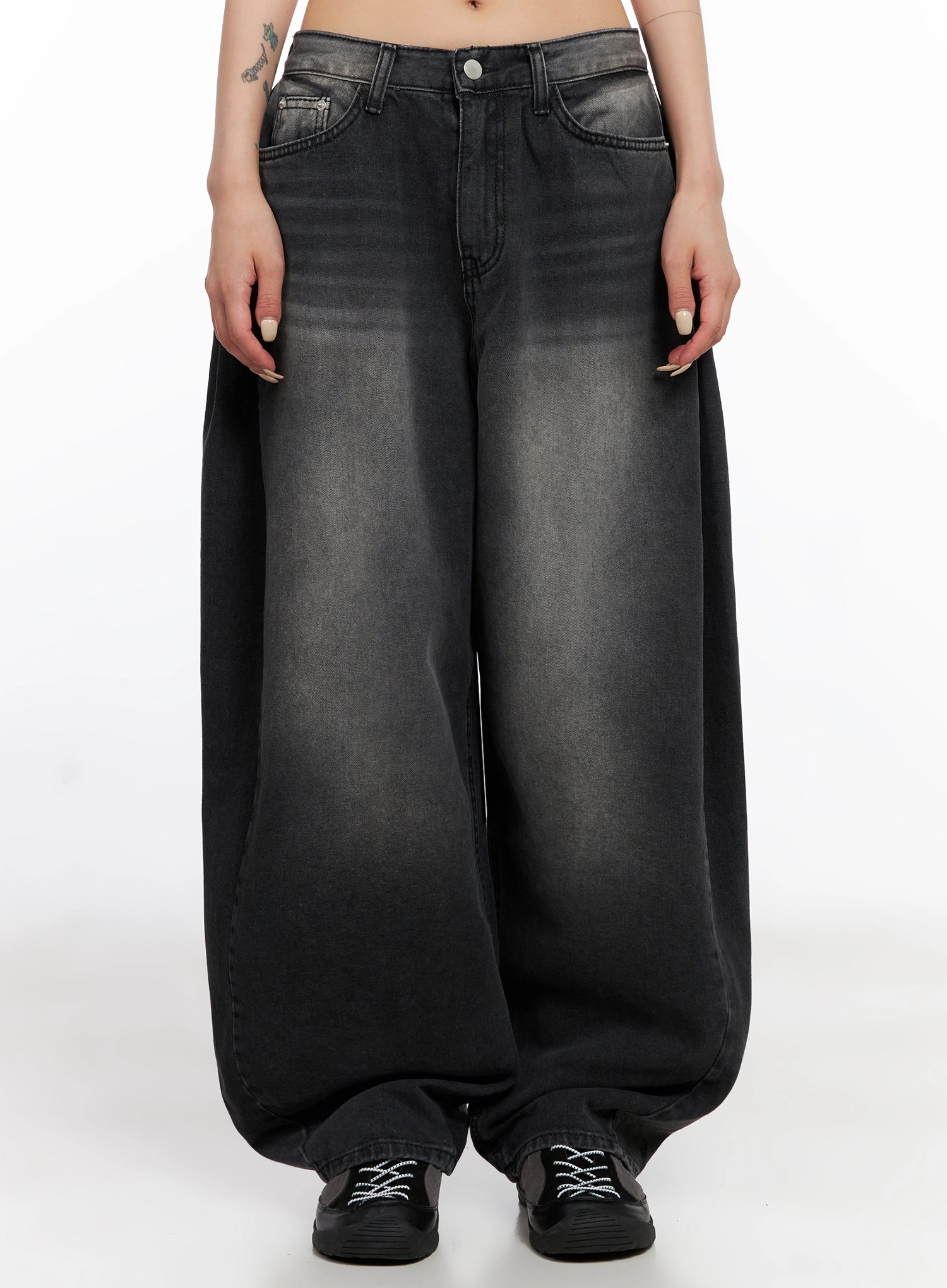 Ayra Dark Washed Baggy Jeans IS508 in dark grey, front view from waist down on model, highlighting ultra-wide baggy leg, two-tone faded wash, and heavily pooled hem over black sneakers.