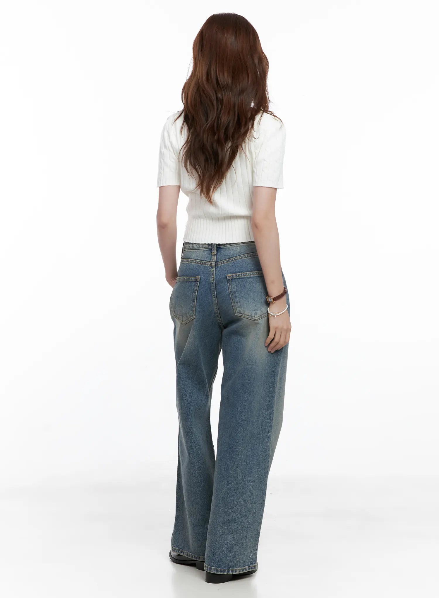 Qu Wide-Leg Vintage Wash Jeans CG521 in blue, full-length back view on model styled with white knit crop top, back pockets and wide-leg hem visible, casual relaxed silhouette.