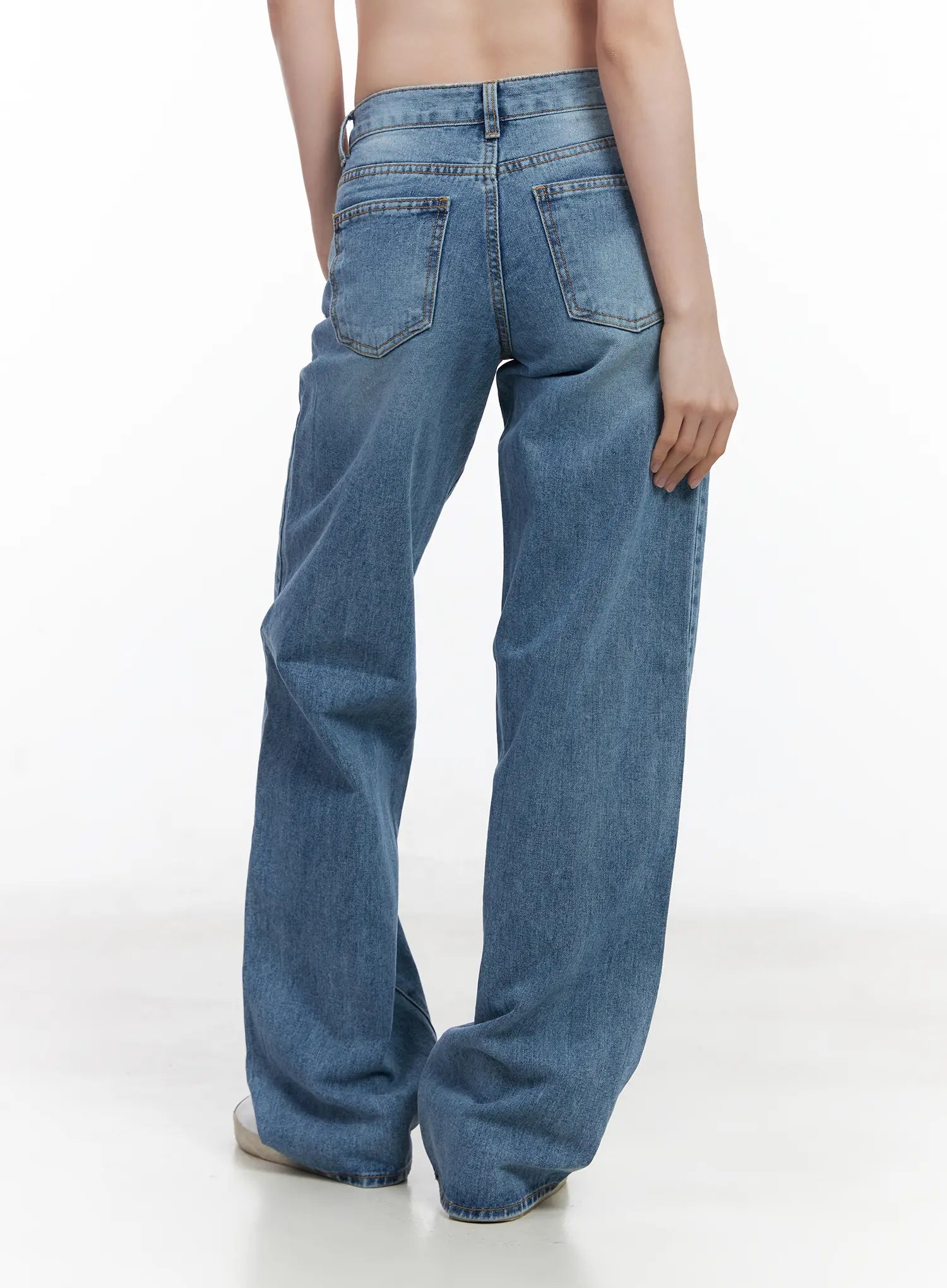 Maisy Casual Wide Leg Jeans CJ519 in blue, back view crop shot on model, dual back pockets with contrast stitching, wide flared hem in washed cotton denim.