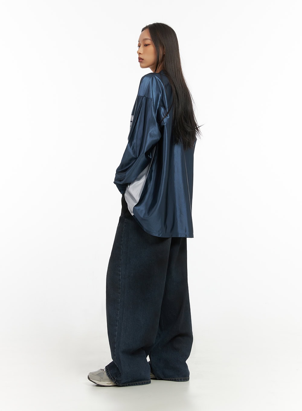 Imogen WashedSky Loose-Fit Denim IO409 in dark blue, full-body side profile on model, wide-leg washed denim showing floor-grazing length, paired with oversized jersey top.