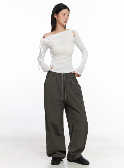 assymetric-cut-out-long-sleeve-top