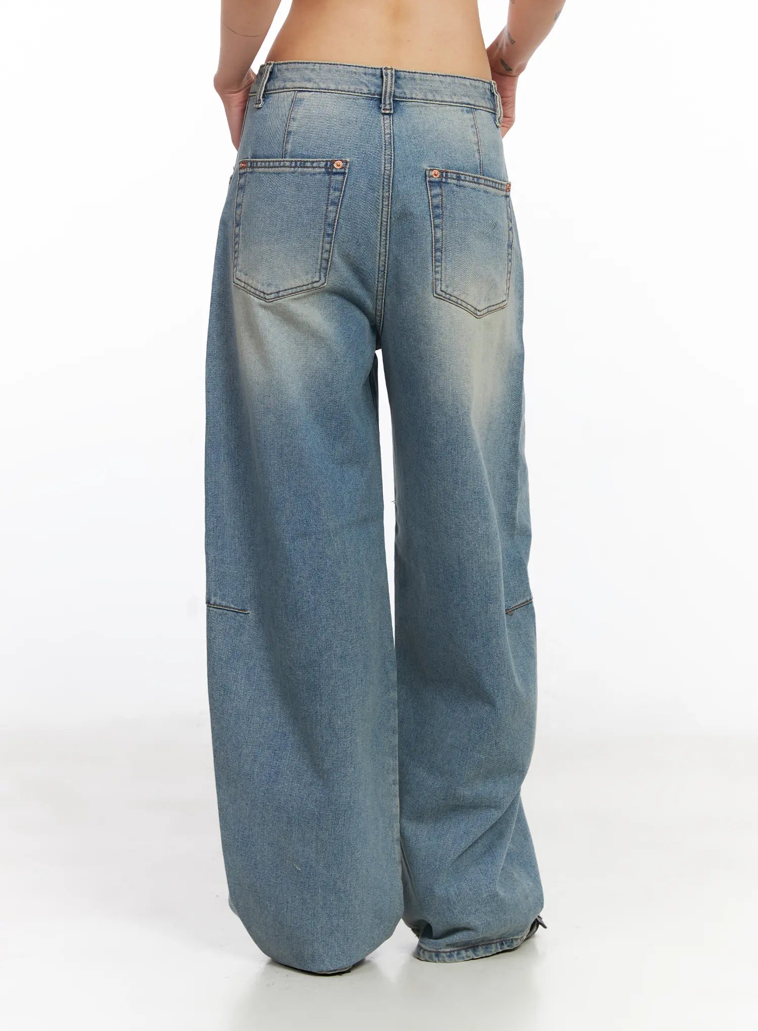 Frey Washed Wide-Leg Jeans CJ523 in light blue, full back view on model, showing wide-leg silhouette, back pockets, panel seams, and washed cotton finish.