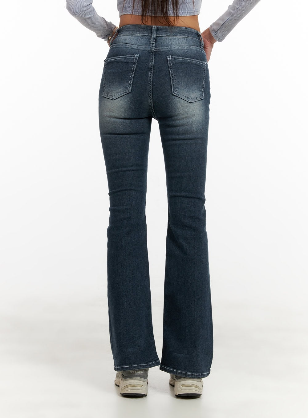 Washed Denim Slim Fit Bootcut Jeans CY402 in blue, back waist-to-hem close-up on model, featuring two rear patch pockets with contrast stitching, slim fit seat, and bootcut flare at hem.
