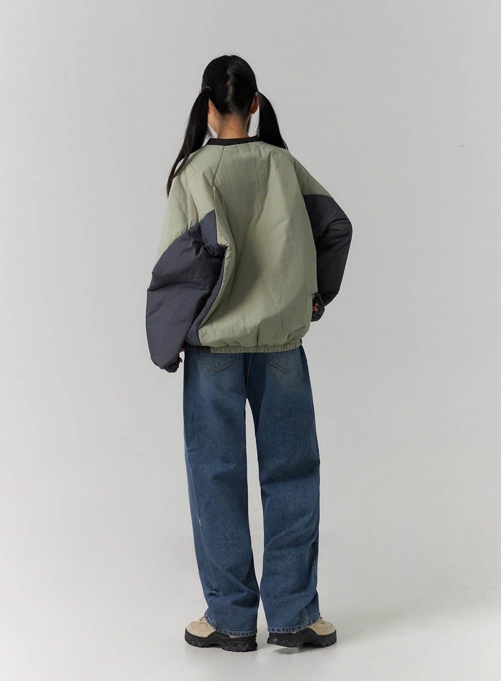Washed Denim Wide Leg Jeans CD308 in blue, rear full-body view on model, back pockets and wide-leg hem visible, washed cotton denim, styled with color-block pullover.