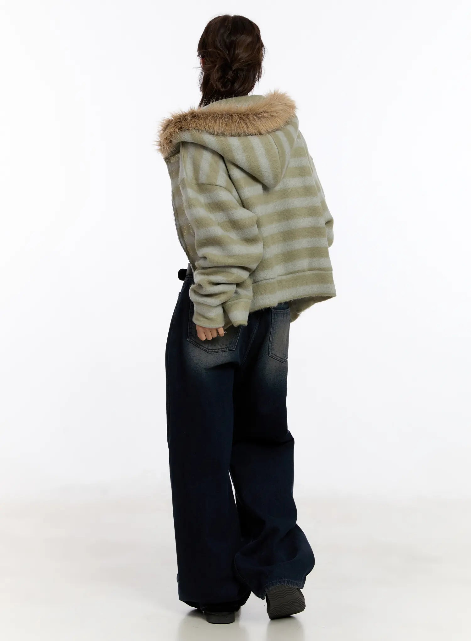 Auro Fleece-lined Wide Leg Jeans CN527 in dark blue, back three-quarter view on model, wide-leg washed denim silhouette styled with striped hooded jacket, back pocket detail visible.