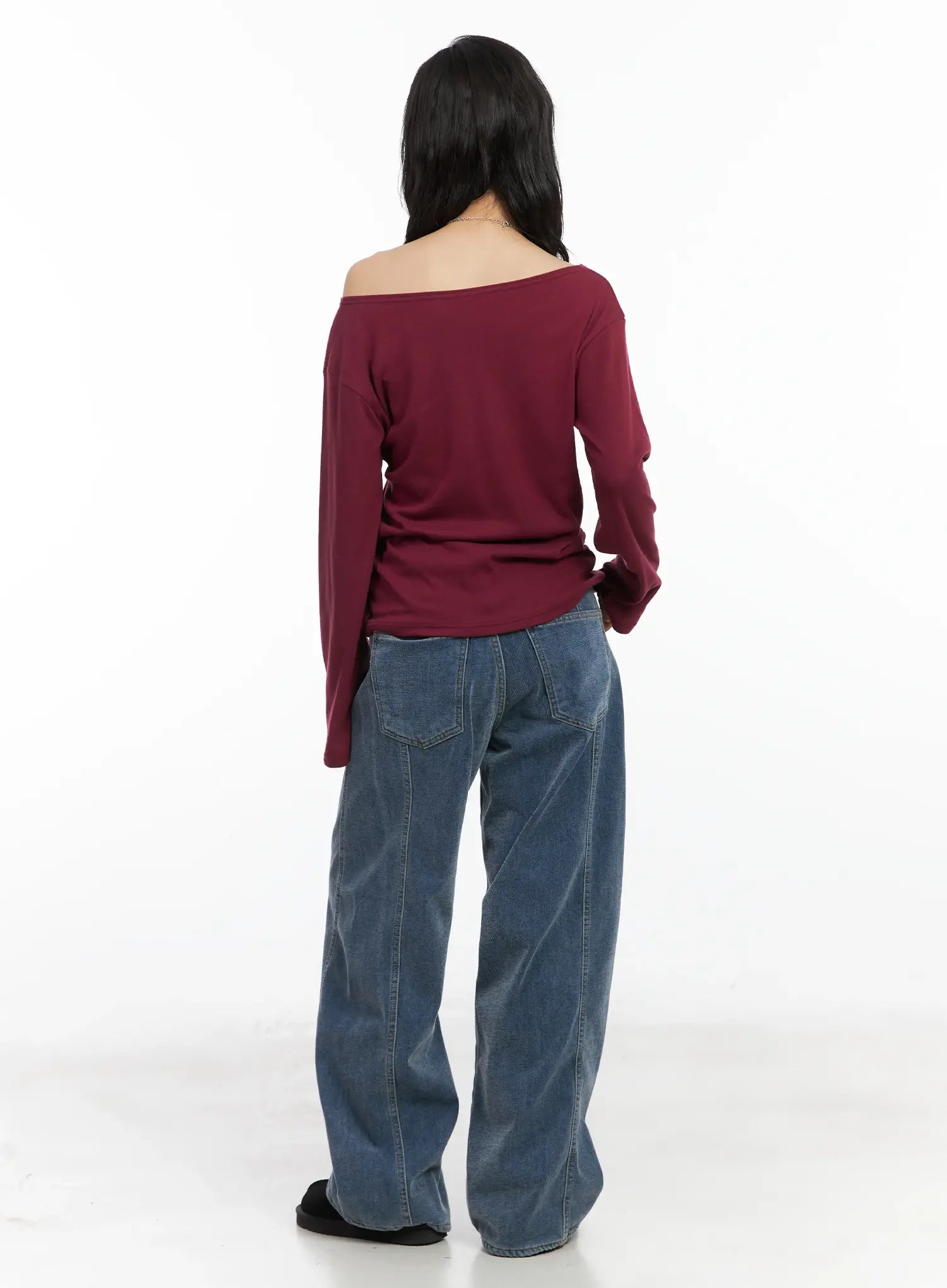 Norah Oversized Jeans CN528 in blue, back full-length shot on model in burgundy off-shoulder top, back pocket placement and relaxed wide-leg length visible.