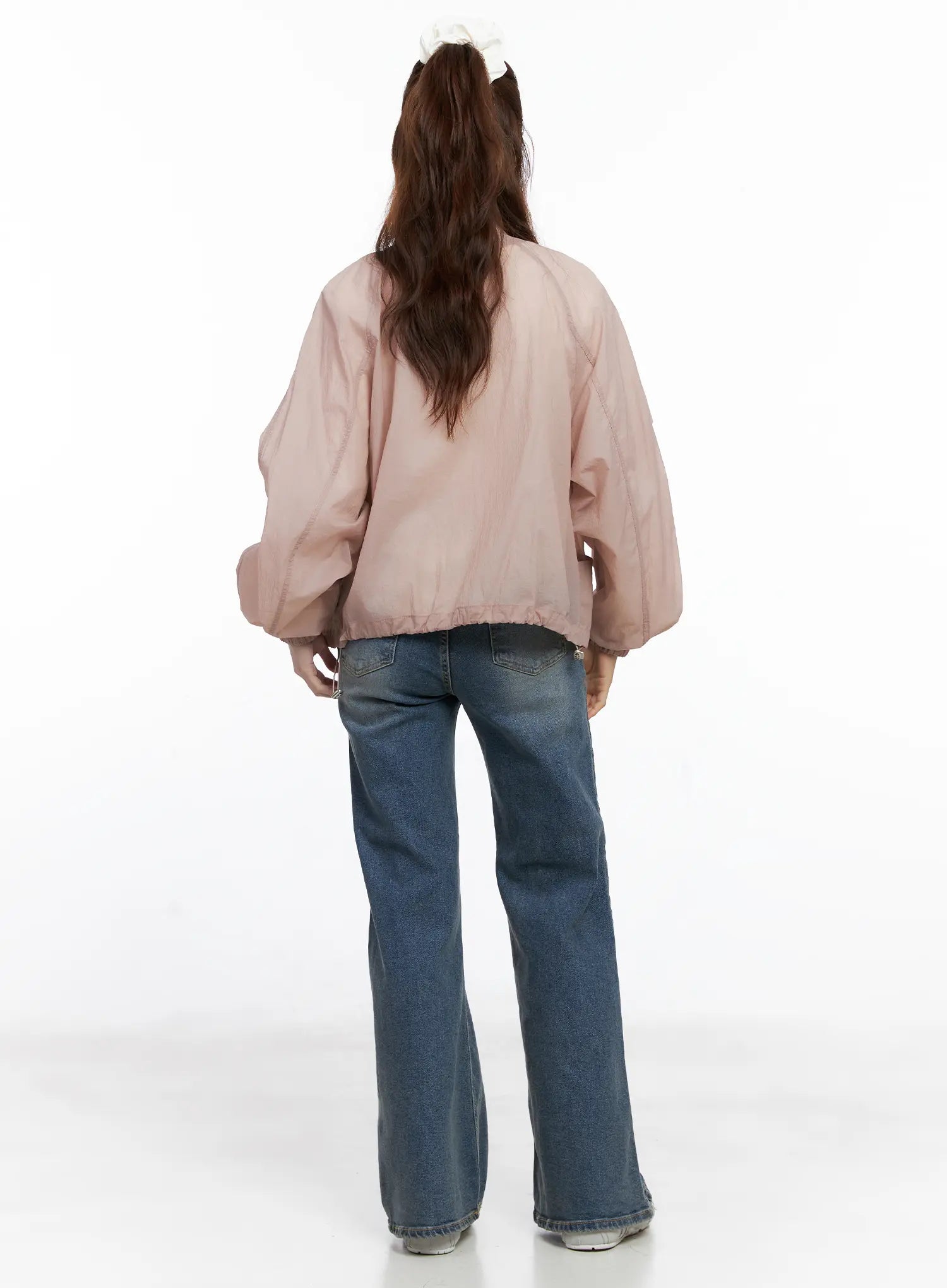 Juae High Waist Flare Jeans CG520 in blue, back full-body on model, flare bootcut leg, styled with oversized pink jacket, back pocket detail visible.