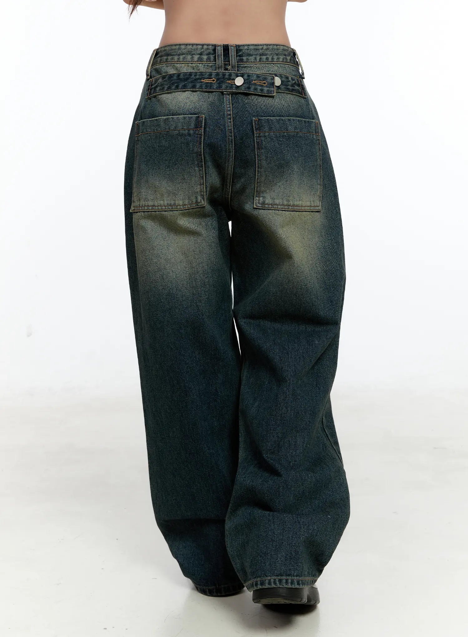 Lilian Vintage Wash Wide-Leg Jeans CS518 in vintage blue-green, back close-up on model highlighting large patch pockets, waistband hardware, and vintage wash cotton fabric.