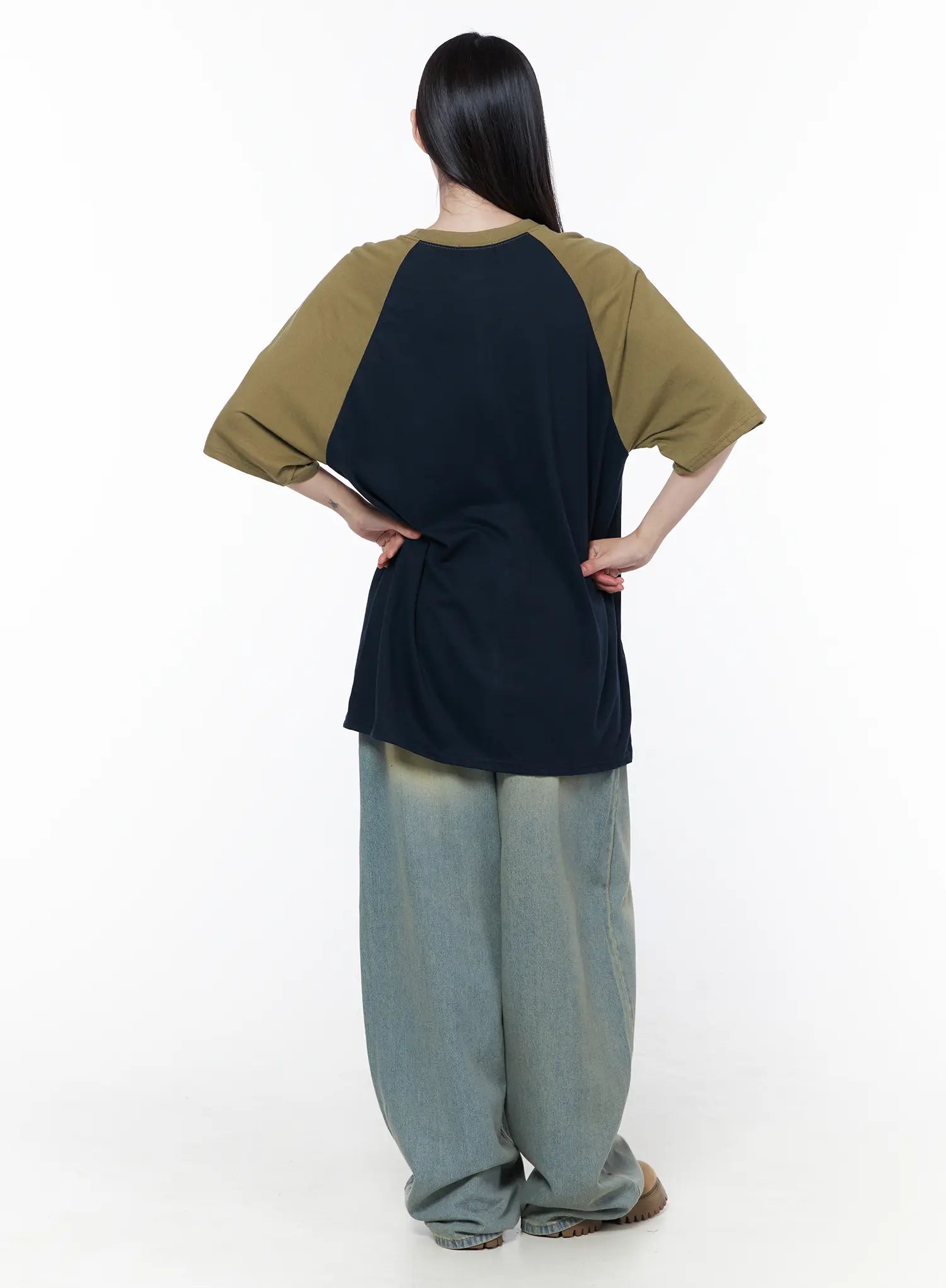 Rain Vintage Washed Wide Leg Jeans CU519 in light blue, back full-body on model, baggy wide leg with vintage wash, paired with navy-olive raglan tee, back view showing denim volume.