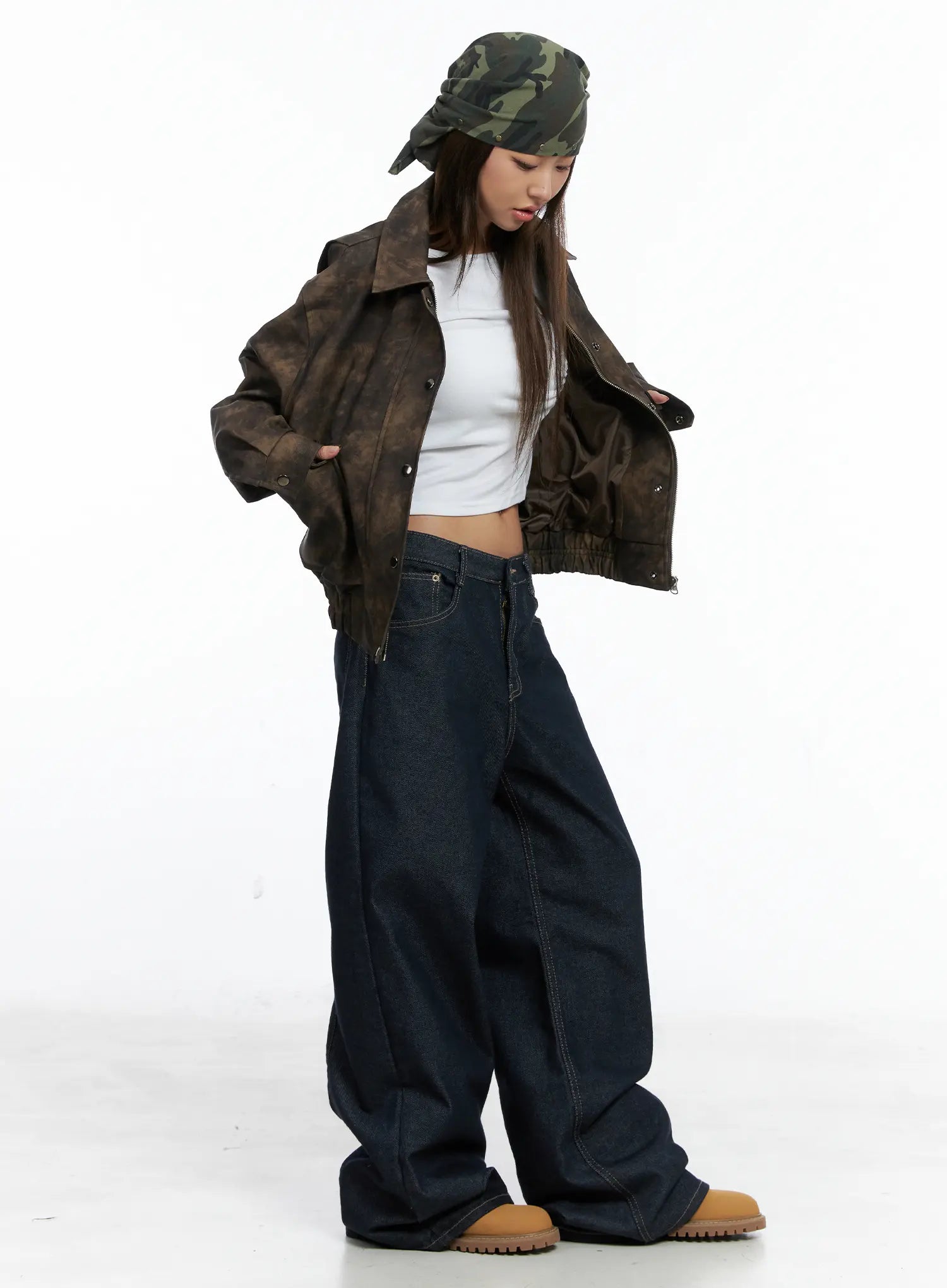 Giada Raw Indigo Wide-Leg Jeans CS505 in dark blue, side editorial shot on model, styled with distressed brown leather jacket and camo bandana, oversized wide-leg denim with stacked hem.