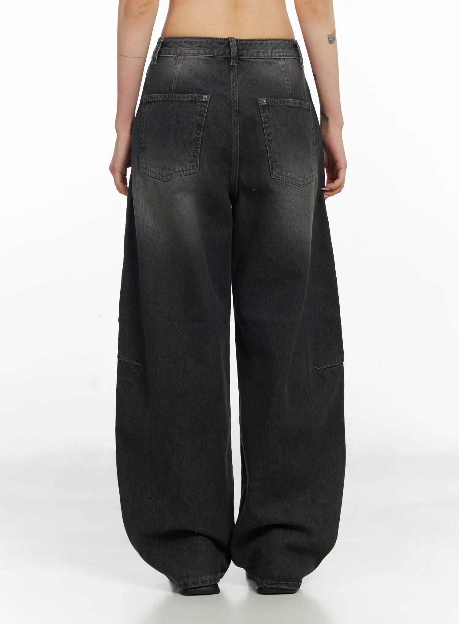 Nayeli Baggy Jeans CJ522 in dark gray, full back view on model, wide baggy silhouette with patch pockets and curved panel seams, washed cotton long length.