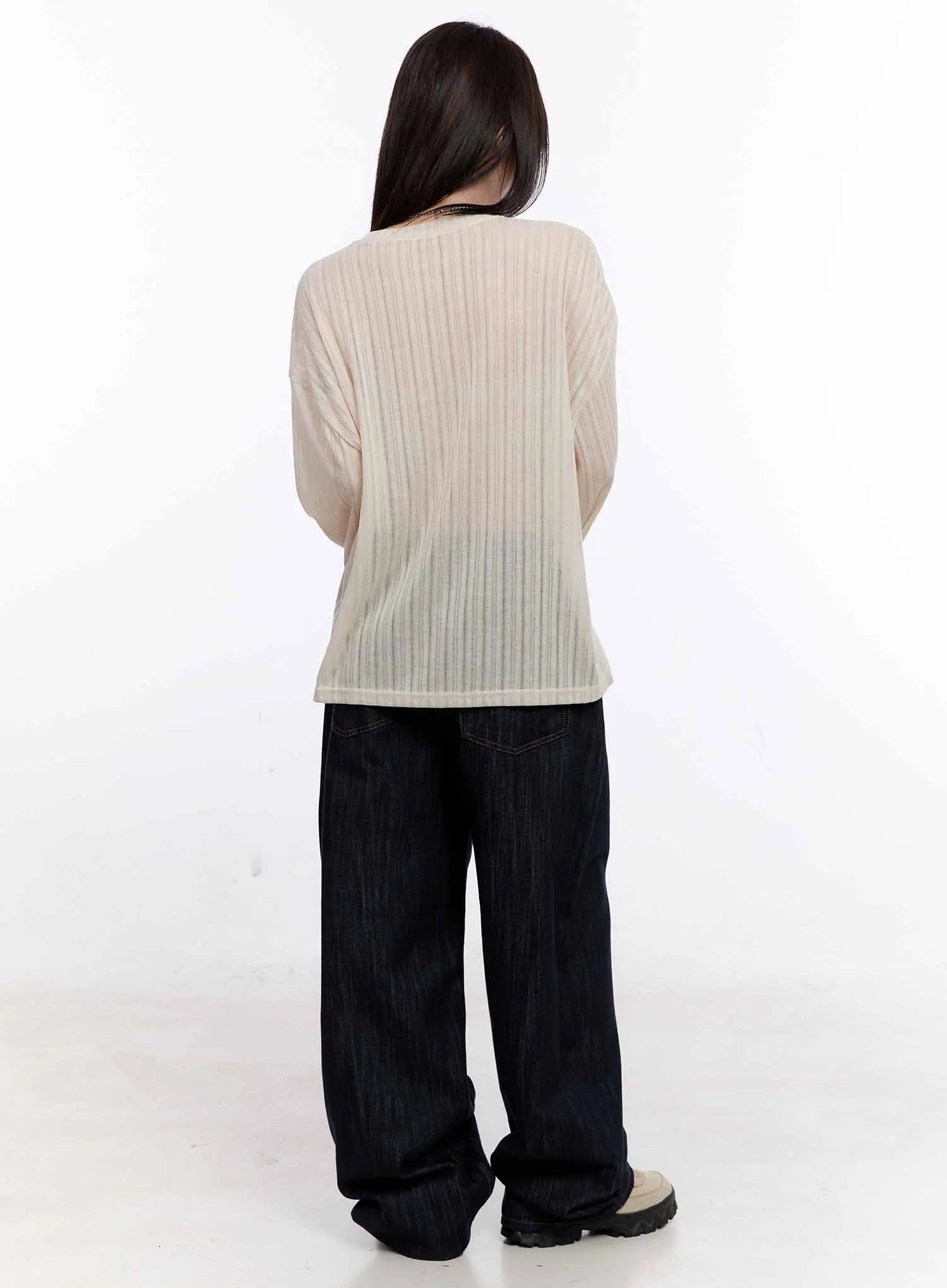 Haewon Dark Washed Baggy Jeans CS530 in dark blue, back full-body shot on model, styled with cream ribbed sheer top, wide straight-leg silhouette with contrast stitching visible at yoke.