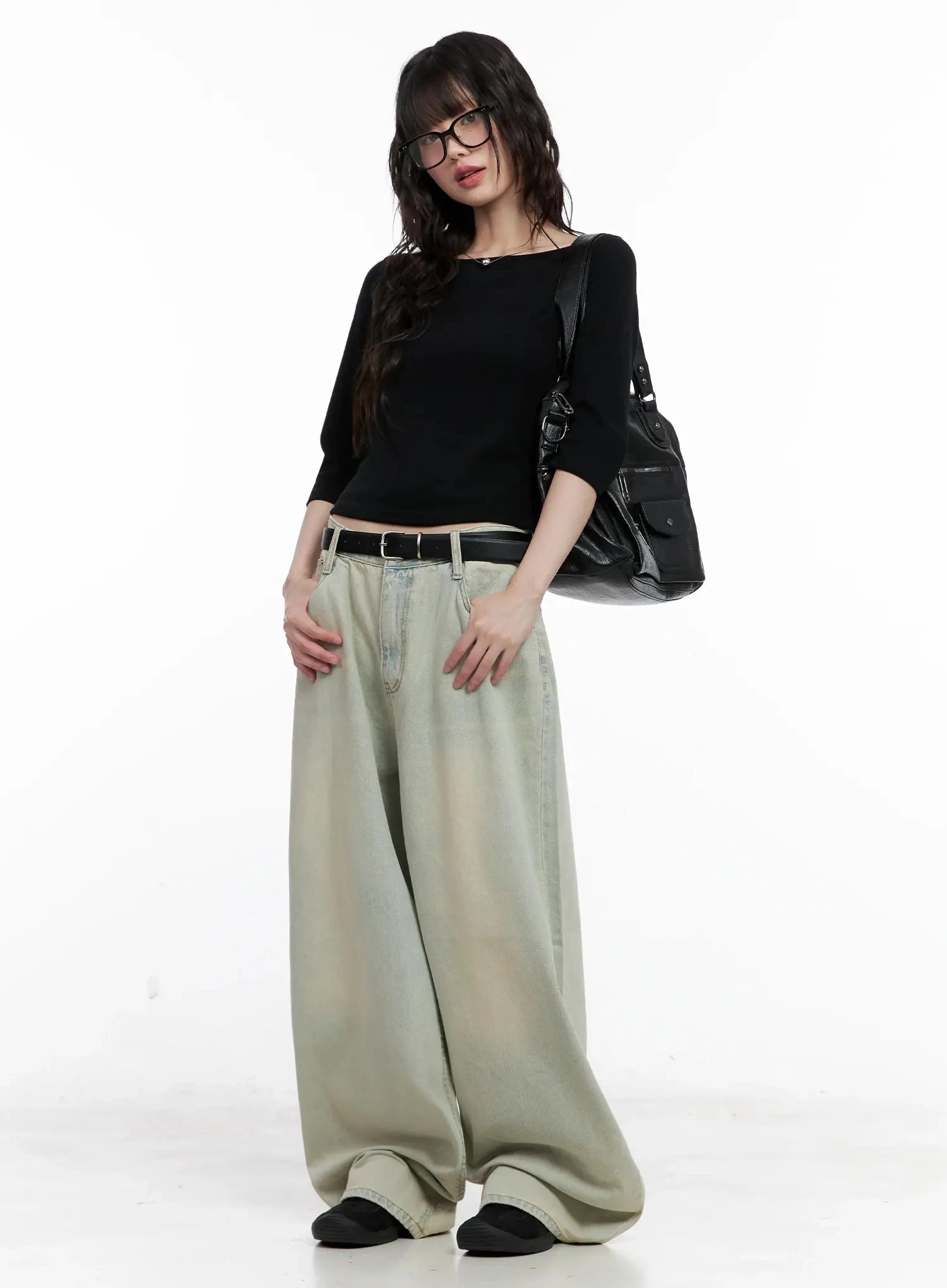 Xiaoting Vintage Style Wide-Leg Denim IL531 in light blue, three-quarter front shot on model with glasses and black bag, wide-leg denim with sun-bleached wash, casual street styling.