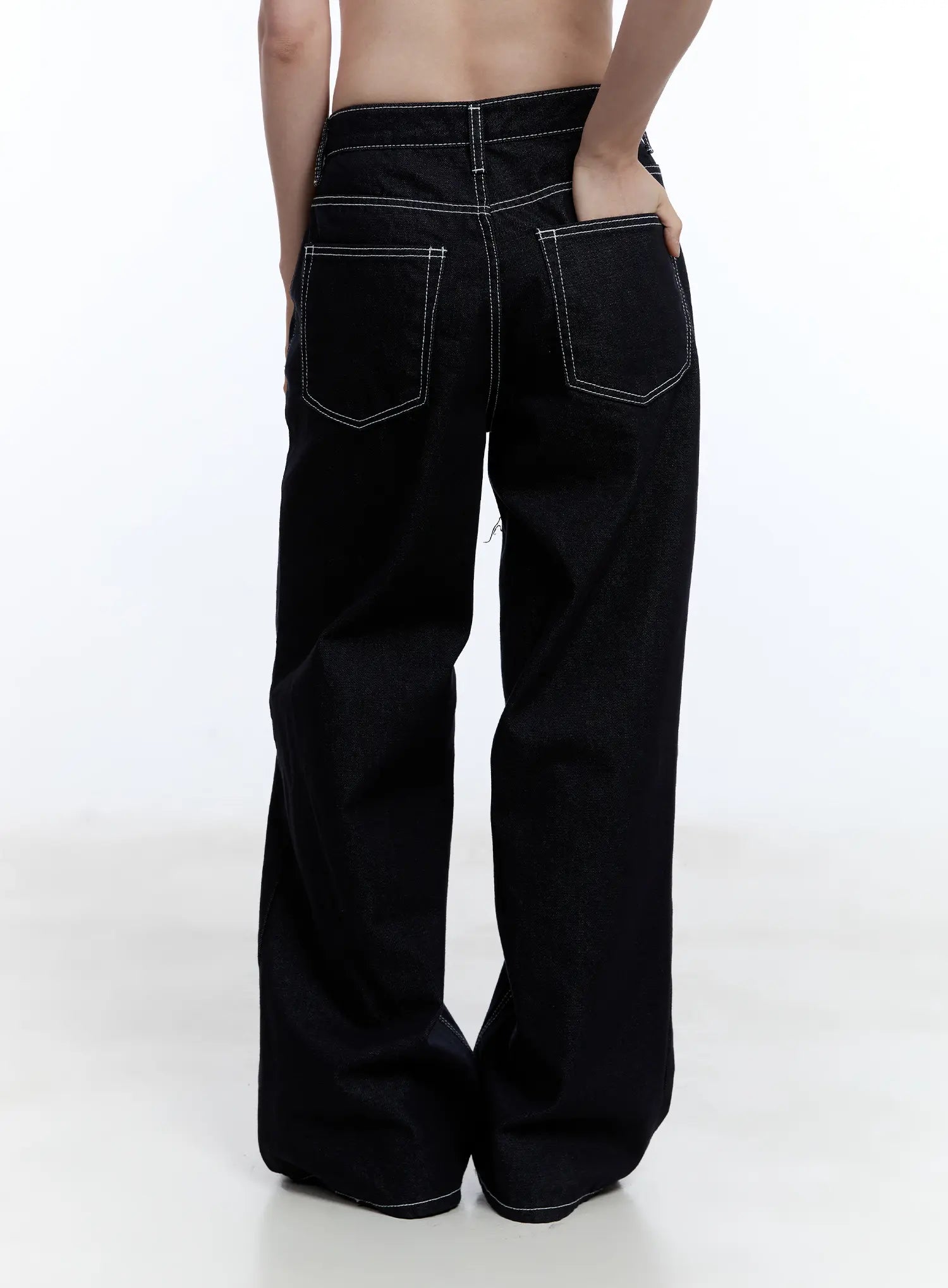 Nayeon No-Fade Denim Jeans CU513 in dark blue, back close-up from waist to hem, highlighting contrast-stitched patch pockets and wide-leg drape on cotton denim fabric.