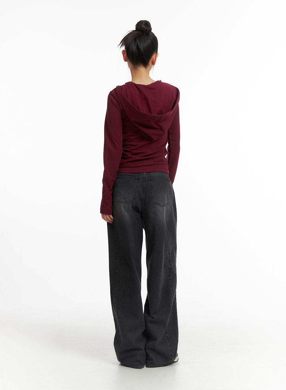 Washed Denim Wide-Leg Jeans CJ426 in black, full-body back view on model, wide-leg washed cotton denim with back pocket detail, petite length, paired with burgundy hooded top.