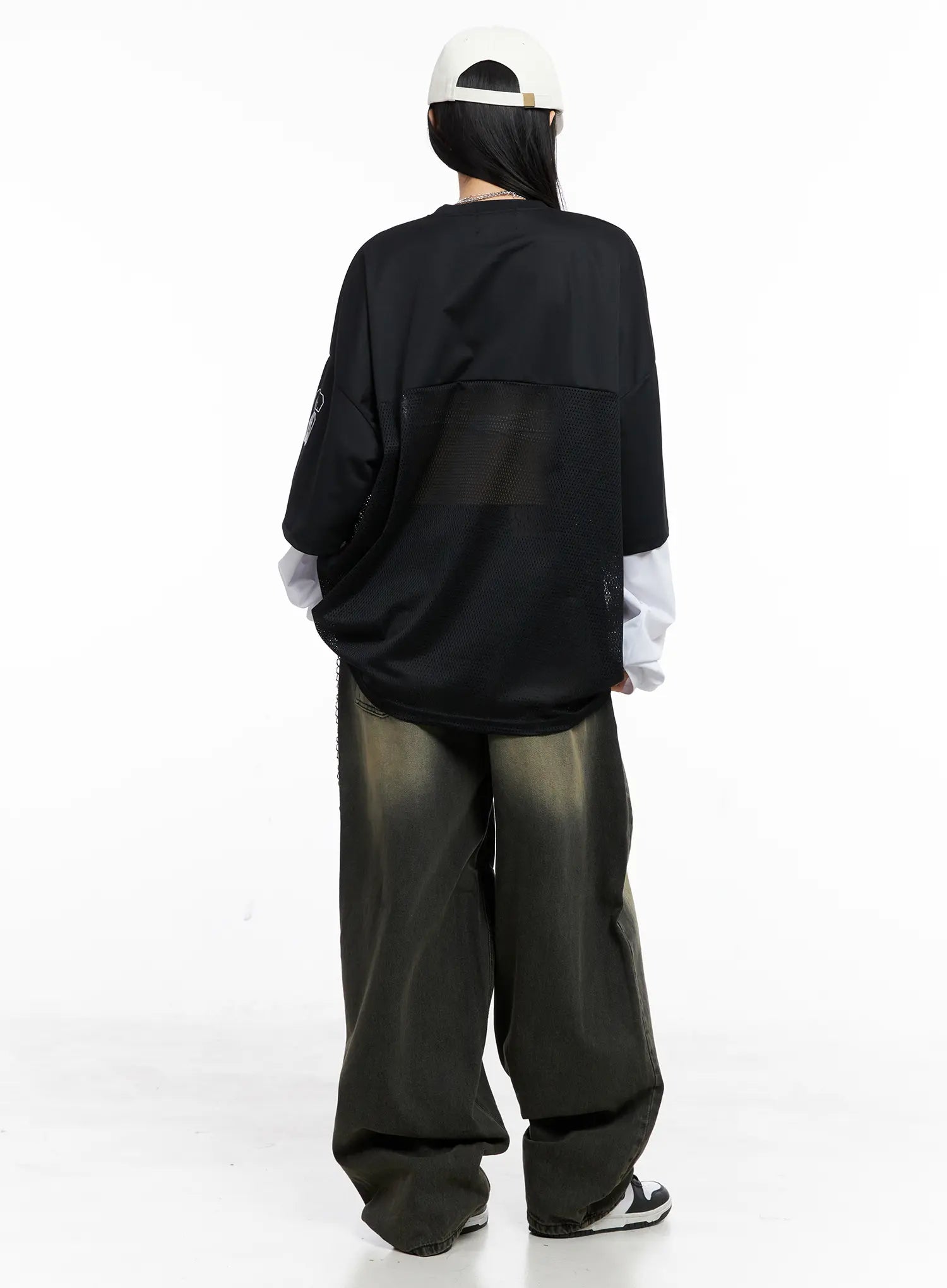 Elias Mega Wide Vintage Washed Jeans CC1109 in black, full back editorial shot on model, styled with oversized mesh jersey and layered long sleeve, showing voluminous wide-leg silhouette.