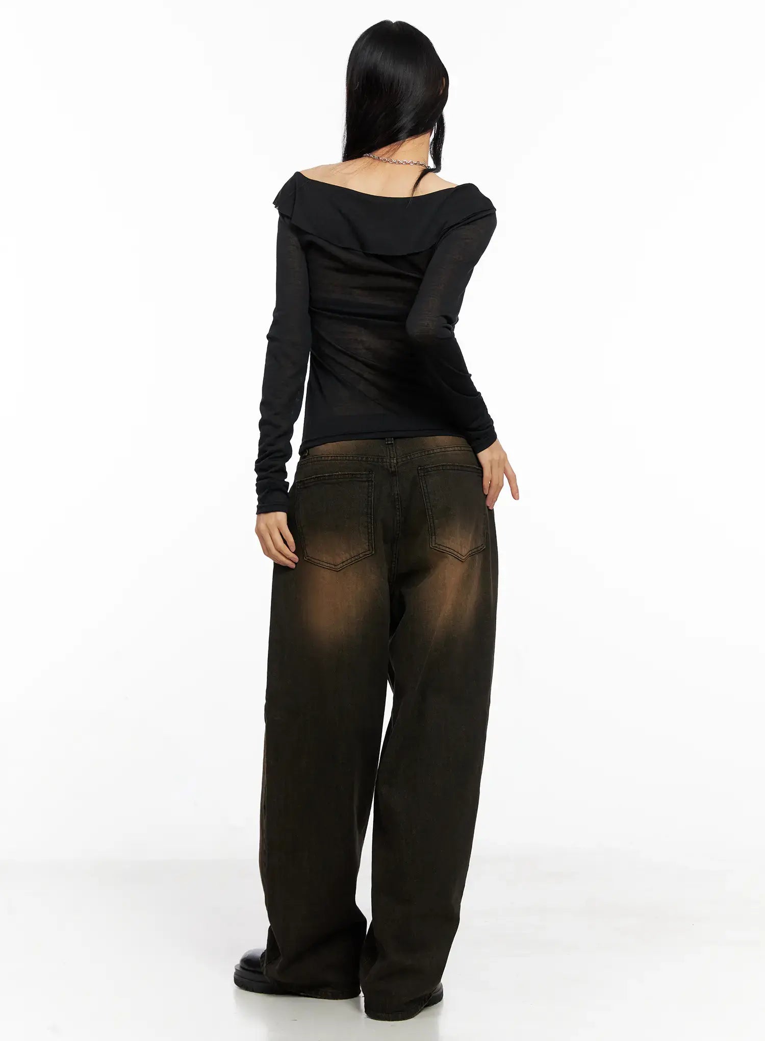 Analia Washed Wide-Leg Jeans CO529 in brown, back full-body shot on model, styled with black sheer top, showing back pockets, waistband, and floor-length wide leg silhouette.