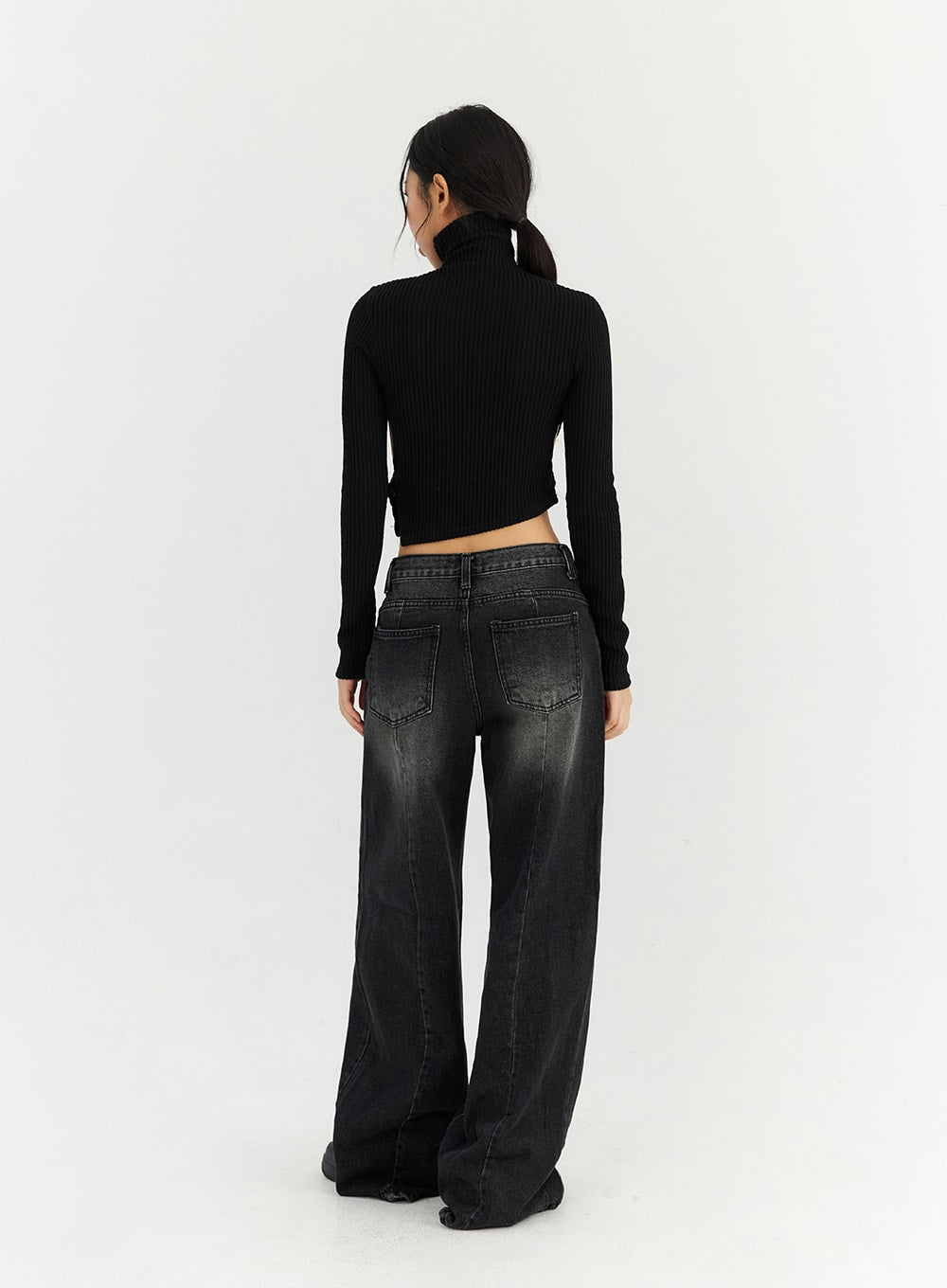 Back Slit Washed Wide Leg Jeans CN306 in Black, full back view on model, rear patch pockets visible, washed black wide leg denim with back slit detail, low waist, tall length.