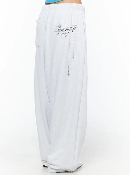 graphic-lettering-studded-wide-leg-sweatpants-cu518