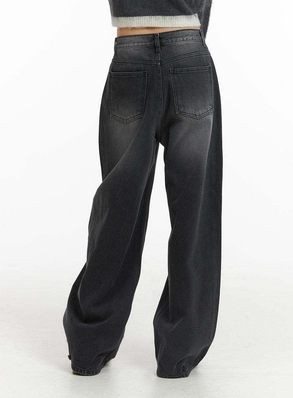 Denim Mid-Waist Pocket Wide Leg Jeans CJ415 in washed black, back close-up on model, highlighting stitched back pockets, washed gradient denim, and wide-leg hem pool at floor.