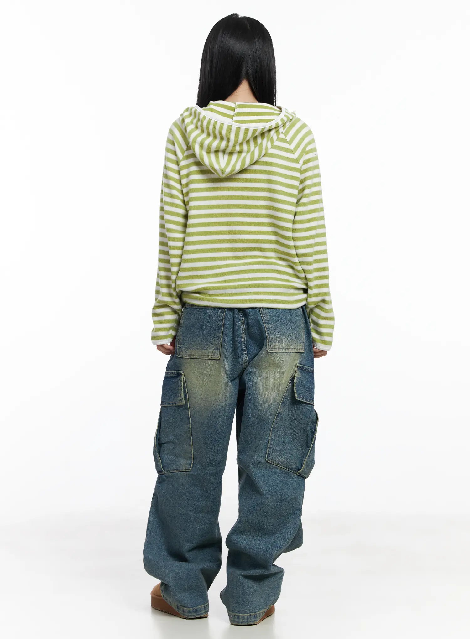 Jake Wide-Leg Cargo Jeans CJ515 in blue, full back shot on model styled with green striped hoodie, back cargo pockets and wide-leg washed denim silhouette clearly visible.