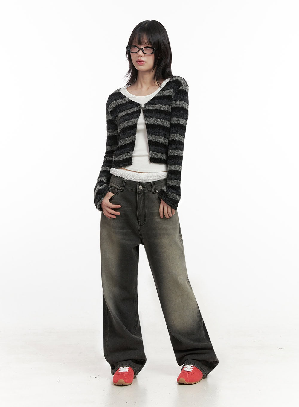 Matilda Wide-Fit Baggy Jeans ID402 in black, full-body front shot on model, washed cotton denim with green-toned fading, relaxed wide-fit leg, layered street style outfit.